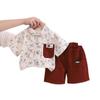 Ropa infantil de comercio exterior al por mayor, novedad de verano 2025, camisa fina con estampado completo de estilo occidental para niños, ropa de dos piezas de manga corta para niños