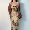 Pintura al óleo de concepción artística madura ligera de estilo francés vestido retro cuello oscilante cintura delgada con cinturón largo medio elegante estilo nuevo chino