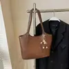 Bolso de mujer nuevo transfronterizo 2026, moderno y a la moda, bolso tote de alta gama, gran capacidad, nicho, simple, bolso de hombro para el día a día