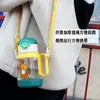 Vaso de paja para niños, lindo vaso de agua de plástico, botella de agua portátil con asa para bebés de jardín de infantes, vaso resistente a caídas con marcas de medición