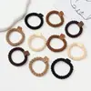 Nueva banda para el cabello elástica duradera de alta elasticidad, liga para el cabello, banda de goma para el cabello, accesorios simples para el cabello de mujer, cuerda para el cabello, tocado de alto sentido, cuerda para el cabello al por mayor
