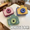 Pistola de agua de doble chorro con forma de cámara, pistola de agua reversible de doble cara, juguete de broma creativo, pistola de agua de He Chen Guang, pistola de agua de doble cara