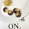 Botones de resina al por mayor en stock con patrones florales, botones para abrigos y gabardinas, botones de resina imitación cuerno, botones finos de cuatro agujeros