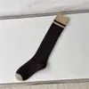 Calcetines de canalé a rayas horizontales para otoño e invierno, calcetines largos de estilo universitario japonés, calcetines hasta la rodilla de colores a juego de moda en Instagram