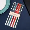 Palillos de aleación para el hogar de alta gama familiares nuevos palillos una persona un color palillos para servir resistentes a altas temperaturas palillos para uñas fábrica al por mayor