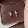 Pendientes de botón con colgante de circonita Iris Dorado Café Versátiles de Moda para Viajes Cotidianos Pendientes de Cuerno Dorados de Titanio Ligeros Simples Franceses para Mujer