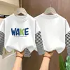 Camiseta de manga larga para niño 2026 nueva ropa de otoño para niños, camiseta básica de algodón puro de imitación de dos piezas para niño, top para niños mayores