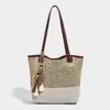 Bolso tote de moda para viajes y vacaciones de verano, bolso de mano versátil de nicho, bolso de hombro simple de gran capacidad para mujer