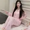 Serie de pijamas acanalados de seda helada para mujer, estilo primavera y otoño, cárdigan de manga larga con cuello en V, conjunto de ropa de casa de moda estilo Chanel 2026