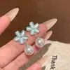 Pendientes de plata s925 con forma de ojo de gato y aguja, con temperamento femenino, geométricos, con un toque de amor, pendientes coreanos al por mayor.