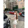 Vestido de Punto de Seda Helada Suave con Cuello de Lazo y Mangas Acampanadas Color Azul Marino, Estilo Academia Inspirado en la Moda Coreana, para Figuras Pequeñas en Verano