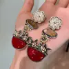 Brincos de Resina com Flores Inlaid Outono e Inverno Brincos de Pétalas de Metal Brincos Étnicos Europeus e Americanos Estilo Retrô