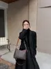 Versión coreana 2026 nueva bolsa vintage floral para el hombro para mujer, bolso de hombro y cruzado de alta gama, bolso tote versátil de moda, bolso de mano