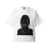 Camiseta de Manga Curta com Estampa de Personagem Travis Scott, Marca Europeia e Americana Tendência Transfronteiriça para Homens e Mulheres, Estilo High Street Americano Saint Manga Curta