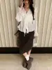 Top con cordones 2026 Primavera y Otoño Estilo Nuevo Blanco Estilo Francés Ligeramente Transparente Diseño de Nicho Chaqueta para Niñas