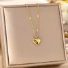 Venta caliente transfronteriza temperamento personalidad cuerpo completo titanio acero collar mujer galvanizado oro 18K cadena clavícula collar joyería no se decolora