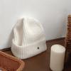 Nuevo gorro de punto básico coreano con etiqueta metálica de nicho de lana, gorro de lana cálido para otoño e invierno, tamaño pequeño.