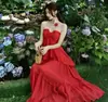 Vestido Francês de Alta Qualidade com Decote Halter e Alças para Mulheres Verão Novo Estilo Resort Beira-Mar Sem Costas Praia Vestido Longo