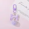 Llavero de lazo a cuadros con pompón, colgante de lazo a cuadros con perla, llavero estilo femenino, regalo al por mayor
