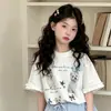 Conjunto de Camiseta de Encaje de Manga Corta y Falda Tutú para Niñas Estilo Verano 2026 para Niños Mayores Dulce Top de Dibujos Animados y Falda Corta
