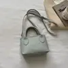 Bolsa de mão feminina de luxo, novo modelo 2026, bolsa de ombro e transversal super popular, bolsa tote pequena requintada, bolsa tipo balde versátil