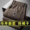 Venta directa de fábrica pantalones casuales para hombre invierno más terciopelo gruesos de pana pantalones de pana para hombre mediana edad sueltos pierna recta pantalones de pana