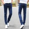 Pantalones vaqueros ajustados elásticos de estilo coreano gruesos con forro polar para hombre de otoño e invierno, pantalones juveniles de cintura media a la moda para hombre