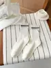Calcetines sin costuras 2026 para mujer, calcetines de algodón de media pantorrilla para primavera con rayas bordadas en el talón, calcetines holgados estilo coreano sin costuras