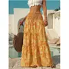 Saia longa estampada de cintura alta estilo resort transfronteiriça europeia e americana, saia estilo boho, nova de verão, solta, com barra larga