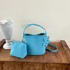Bolsa Balde de Mão Simples Versátil Cor de Doce Estilo Coreano Feminina 2026 Início do Outono Bolsa Transversal para o Trabalho Grande Capacidade Tendência