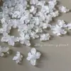 Decoraciones para uñas de flor de cristal de hielo tallada suave, modernas y versátiles, blanco translúcido, flor de cuatro pétalos tridimensional para decoración de uñas, pedrería de resina, al por mayor
