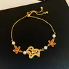 Pulseira de Rede Azul Dourada com Flor de Vidro Pérola Zircônia Brilhante Pulseira Elegante de Luxo Leve Joia de Mão Versátil da Moda