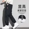 Pantalones casuales grises de otoño para hombre, corte holgado, con puño, pantalones de nueve puntos, marca de moda nueva 2026, pantalones deportivos tipo harén con retazos