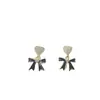 Nuevos Pendientes de Corazón con Lazo Negro Sencillo de Aguja de Plata S925 para Mujer Coreanos de Lujo Ligero Temperamento Joyería de Oreja de Alta Gama Tendencia