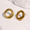 Pendientes geométricos minimalistas de acero inoxidable de moda transfronterizos, diseño circular simple, pendientes únicos y exquisitos de acero de titanio para mujer