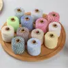 En stock venta al por mayor hilo de algodón 2 mm borla hecha a mano colgador de plantas material tejido hilo de ganchillo decorativo navideño