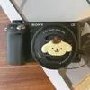 Tampa de lente de câmera digital corda anti-perda palma capivara urso morango kulomi katong acessórios micro SLR