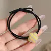 Goma elástica y duradera para mujeres, adecuada para atar coletas altas, modelo 2026 nuevo, liga para el pelo, accesorio para el cabello