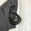 Bolso de mano con textura estilo Hong Kong 2025 otoño e invierno nuevo bolso de mujer casual bandolera hombro axila mano media luna