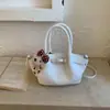 Bolso Moderno y Elegante con un Ambiente Relajado, Nuevo Bolso Tote Pequeño Primavera 2026, Bolso Cubo Plegado, Bolso Cruzado