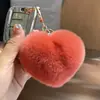 Lindo llavero de coche con forma de corazón de pelo de nutria, bola de felpa de moda, charm de mochila con forma de corazón, regalo