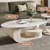 Nova mesa de centro oval em pedra sinterizada de luxo leve estilo italiano para apartamentos pequenos, sala de estar moderna, uso doméstico simples, combinação de armazenamento de alta qualidade