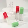 Nuevo tubo de brillo de labios en rosa con un degradado de ola, tubo de brillo de labios negro, herramienta dispensadora, material de empaque cosmético, tubo de brillo de labios vacío