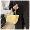 Bolso de mano informal de color sólido de estilo occidental, bolso grande de moda simple, bolso de mujer, nuevo estilo de invierno 2024, bolso con textura debajo del brazo