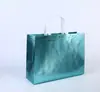 Bolsas de TNT com impressão a laser em estoque para lojas de roupas, sacolas de compras ecológicas com impressão de logotipo personalizado