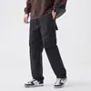 Calças casuais de primavera e verão para homens, calças jogger de corte solto, calças de moletom casuais estilo Hong Kong, novas calças casuais masculinas