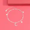 Venta al por mayor de fábrica versión coreana de la pulsera de doble capa de estrella y luna de Mori para mujer diseño nicho ins estrella y luna Pulsera de Estrella
