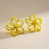 Pendientes Europeos y Americanos Transfronterizos de Flor Hueca con Goteo de Aceite, Pendientes Versátiles Simples y Dulces, Pendientes de Nicho de Alta Gama para Mujer