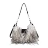 Chegada Nova 2026 Bolsa de Mão de Pelúcia Europeia e Americana Bolsa de Ombro Anti-Pelo de Animal Elegante Degradê Temperamento Fashionável Bolsa com Franja
