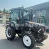 El tractor de cuatro ruedas 704 tiene gran potencia y gran versatilidad, capaz de cavar zanjas y arar rotativamente, un tractor con ruedas mediano multifuncional